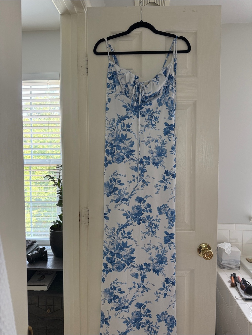 Sleeveless White Maxi Dress with Blue Floral Print